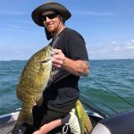 Angler with big smallmouth bass img2246