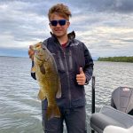 Boy with smallmouth bass img1579