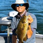 Hat man with smallmouth bass img4943