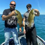 Man and boy 2 smallmouth bass img5245