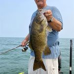 Man with nice smallmouth bass img1677