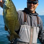 Scott Dobson admiring smallmouth bass img4498