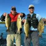 Two anglers smallmouth bass img2557