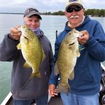 Two anglers two smallmouth bass img3955