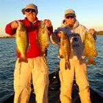 Two anglers with 4 smallmouth bass img1990