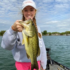 Young lady with largemouth bass